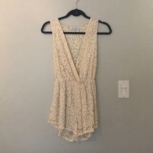 Lacy cream romper